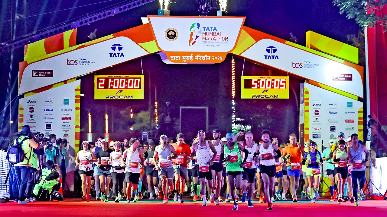 Tata Mumbai Marathon start gate with bold, cinematic typography and elevated sponsor branding