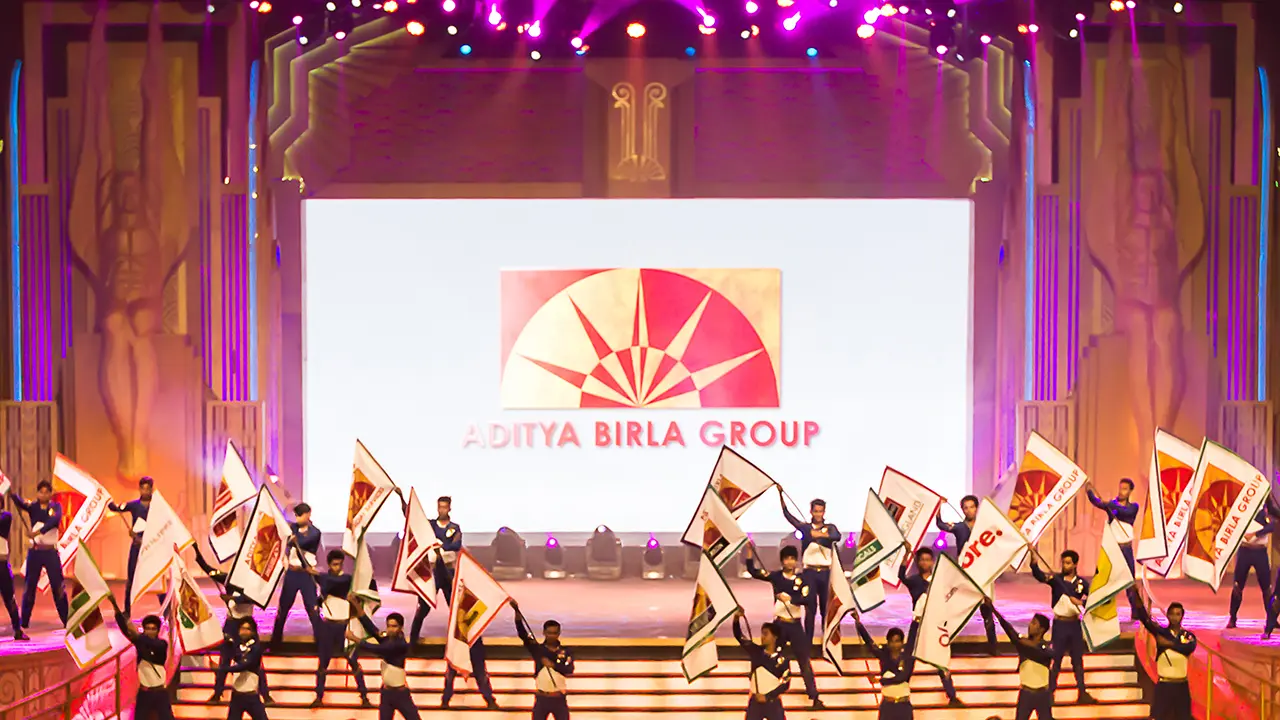 Flag dancers at Aditya Birla Group Awards 2015 representing group companies — branding, event choreography, creative direction
