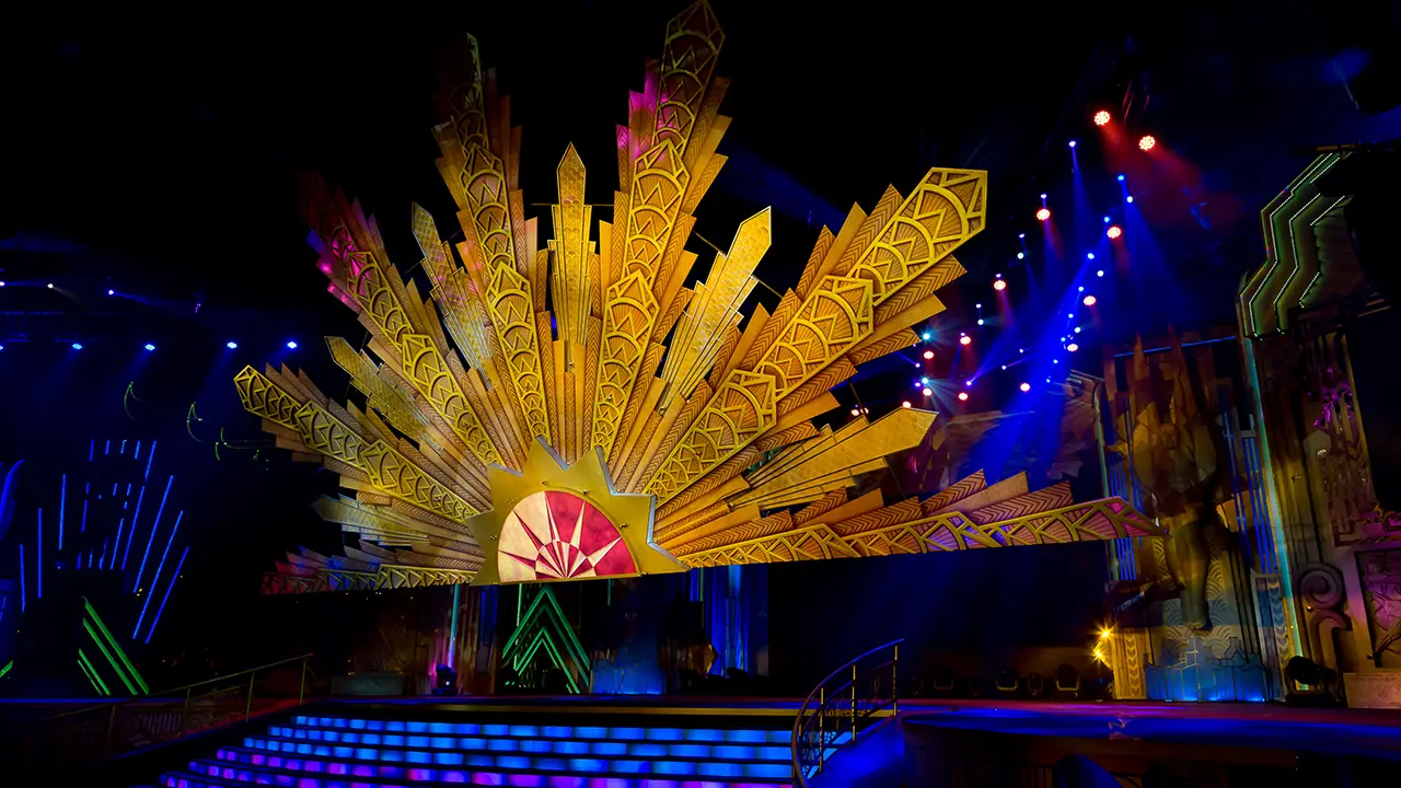 Art deco sunburst stage design for ABG curtain raiser, showcasing experiential event creative direction and brand storytelling