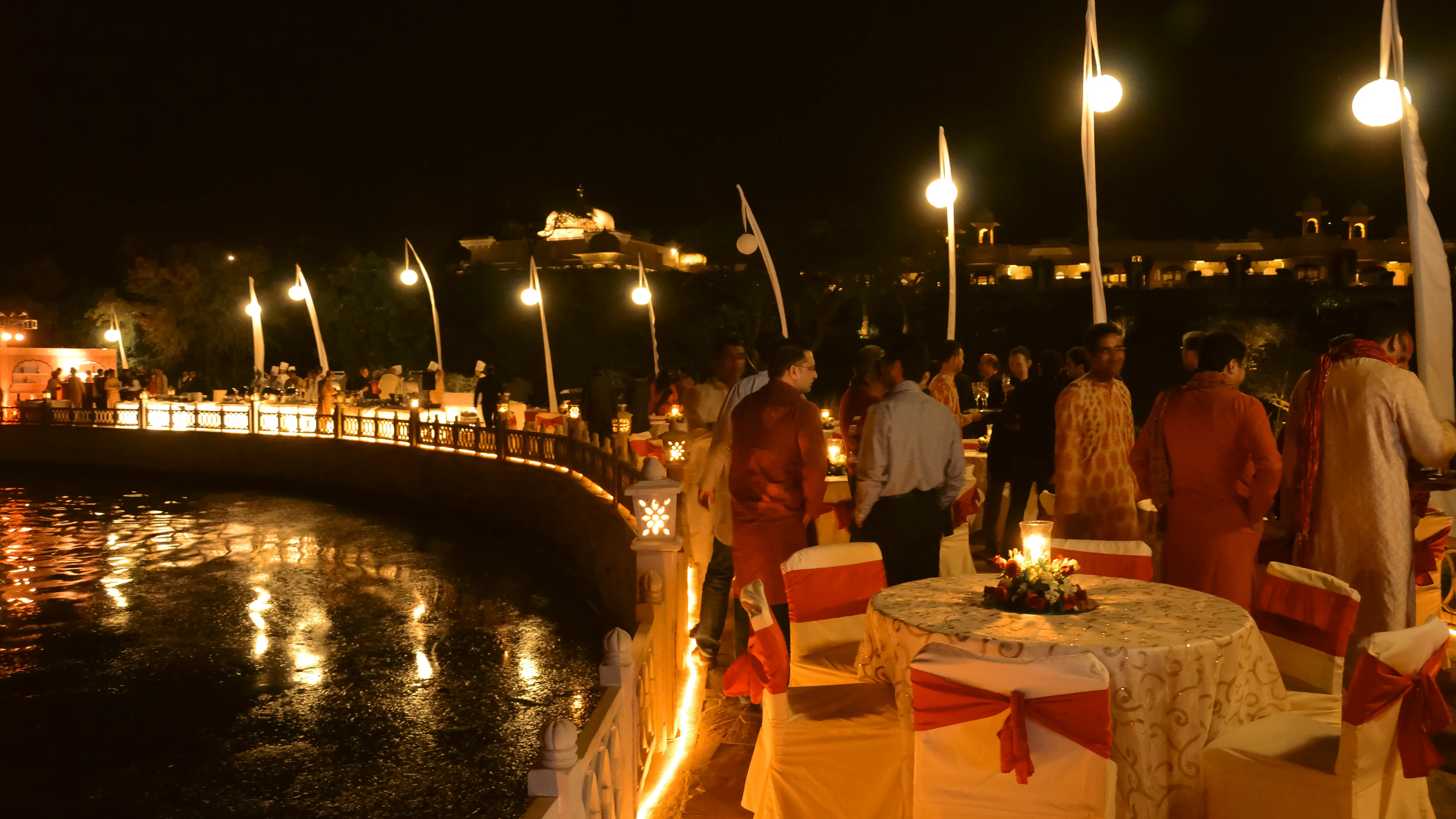Guests enjoy lakeside dinner at Audi Welcome Night, fusing luxury hospitality with ambient cultural storytelling