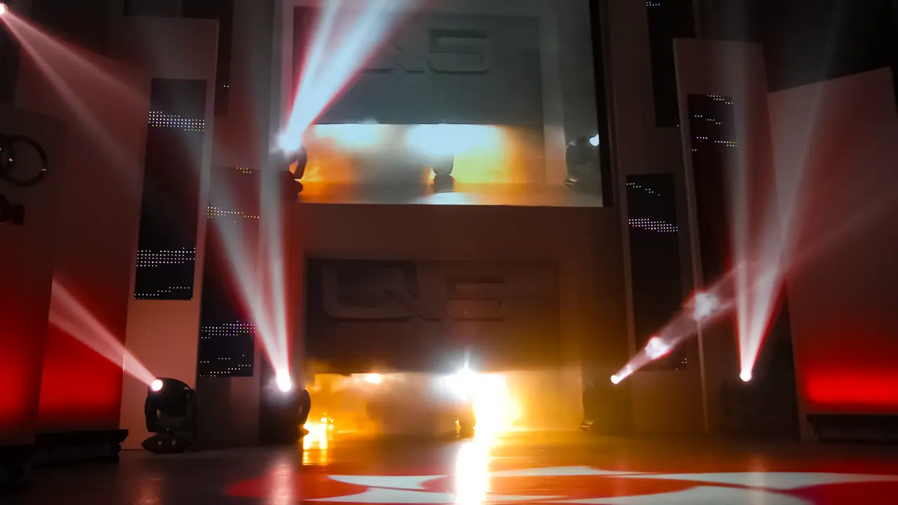 Lighting reveal sequence at Audi Q5 launch showcasing immersive stagecraft, brand architecture, and event production design