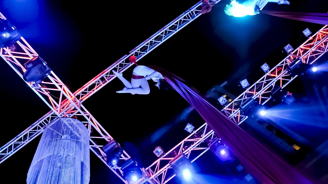 Aerial silk performance at Fiat Linea India launch event showcasing creative direction, luxury entertainment, and spatial choreography