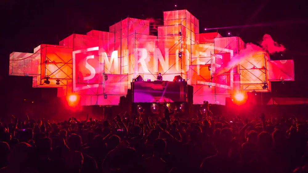 Immersive crowd-stage shot from Smirnoff Experience showcasing branded scenography and experiential IP vision in action