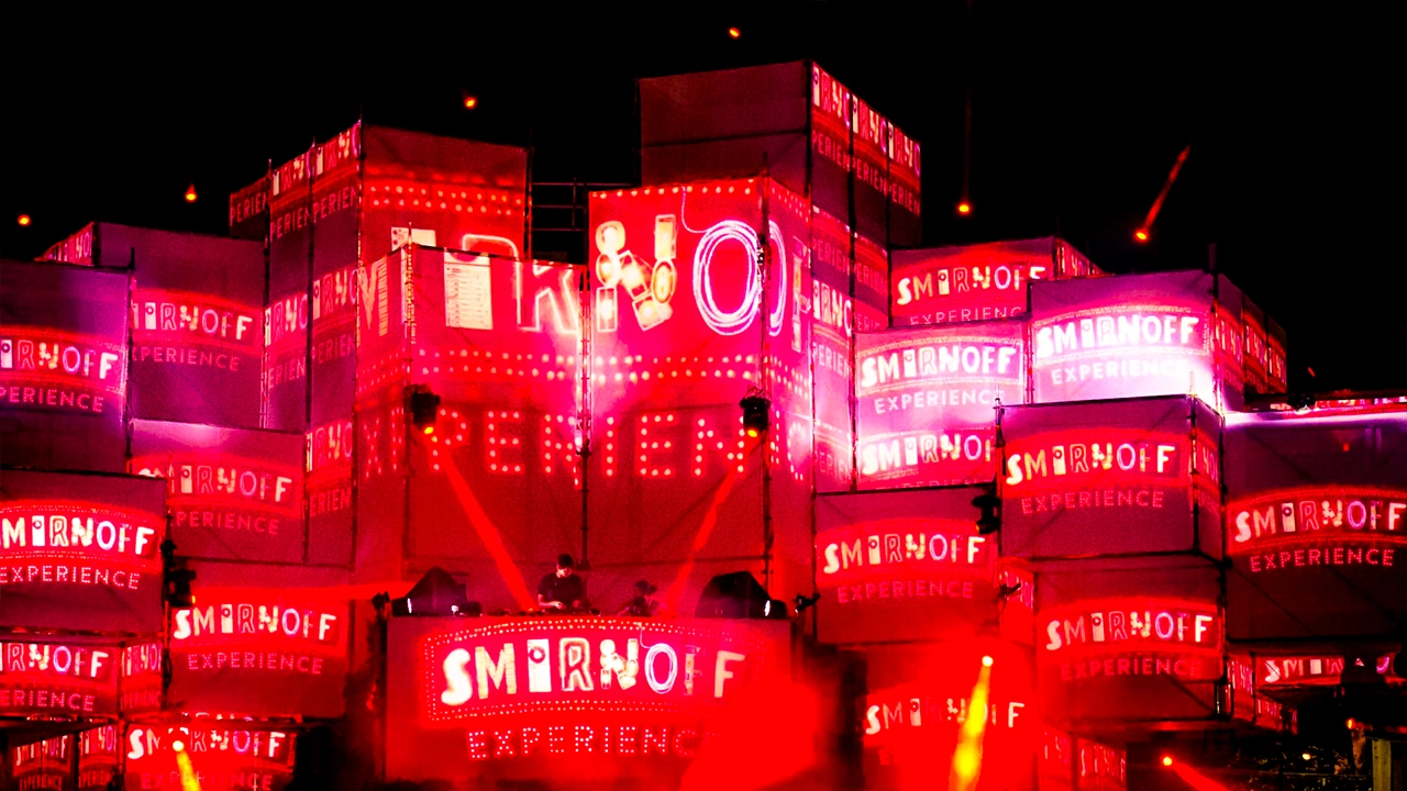 Smirnoff Experience stage with immersive pixel cloud projection mapping and festival-style lighting