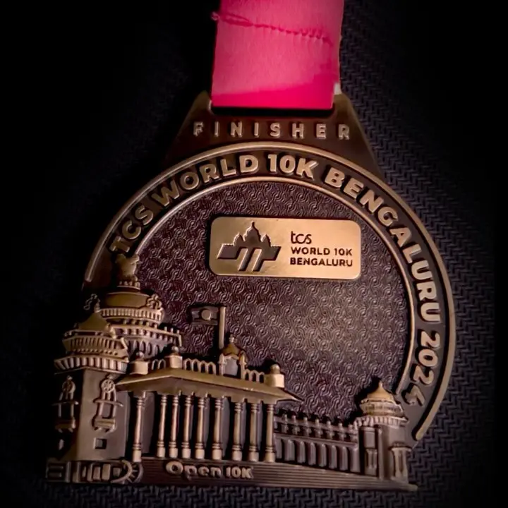 Thumbnail for TCS World 10K Bengaluru finisher medal unboxing video reel